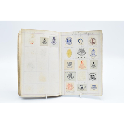 198 - Antique crest book to include crests from: MPs, Royalty and famous figures, hotels, schools, militar... 