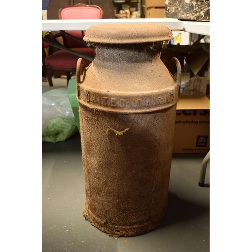 200 - 20th century milk churn 'United Dairies Wholesale LTD'. Badly rusted. Small dent in the side. 72cm t... 