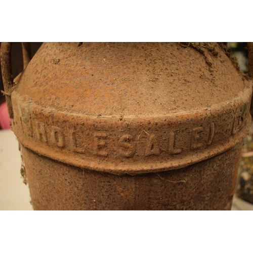 200 - 20th century milk churn 'United Dairies Wholesale LTD'. Badly rusted. Small dent in the side. 72cm t... 