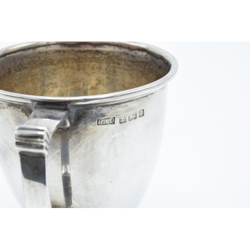 202 - Silver christening mug made by Roberts and Pore, hallmarked for Birmingham 1943 (82.1 grams) In good... 