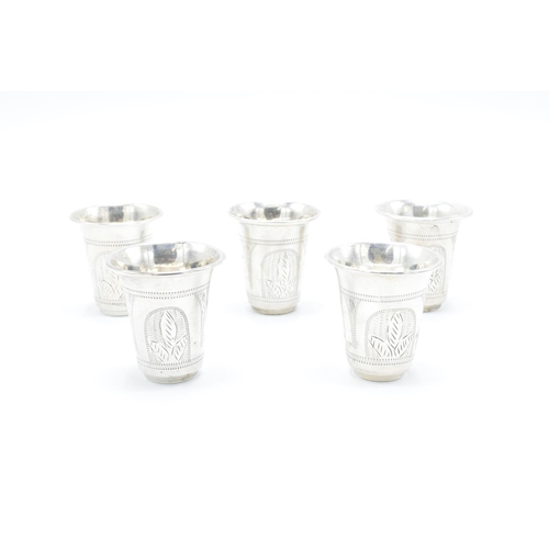 248 - A collection of 5 matching silver Kiddish cups Birmingham 1919 (72.4 grams) 4.5cm tall. With some mi... 