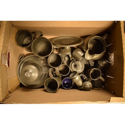 254 - A good collection of mainly 19th century pewter to include hot plates, jugs, tazza, teapots etc