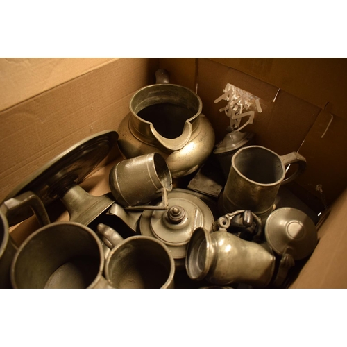 254 - A good collection of mainly 19th century pewter to include hot plates, jugs, tazza, teapots etc