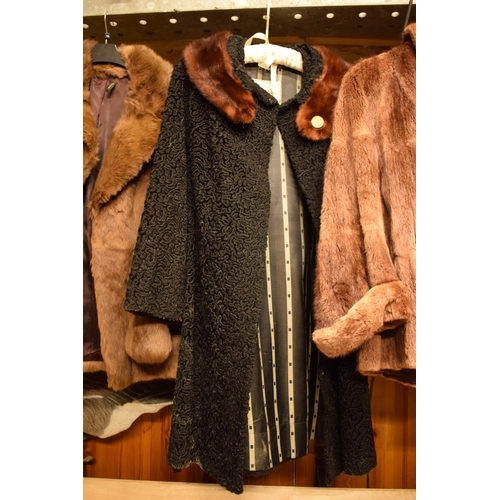 259 - A collection of mid 20th fur coats to include 1940s Astrakhan with a mink collar and other to includ... 