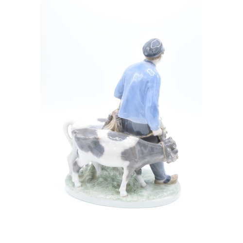 262 - Royal Copenhagen figure Boy with Calves 1858. In good condition. 24cm tall