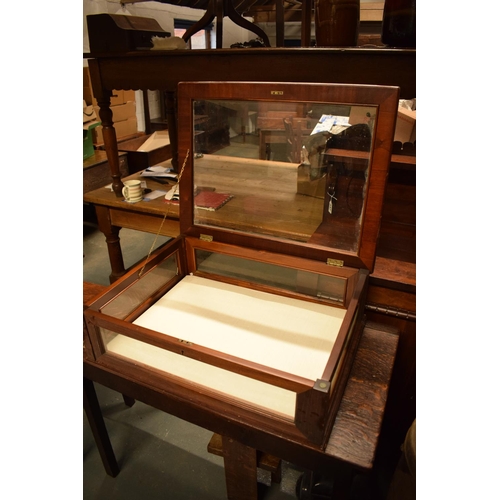 282 - 20th century mahogany and glass table top display case. Wear to the wooden edges which are scratched... 