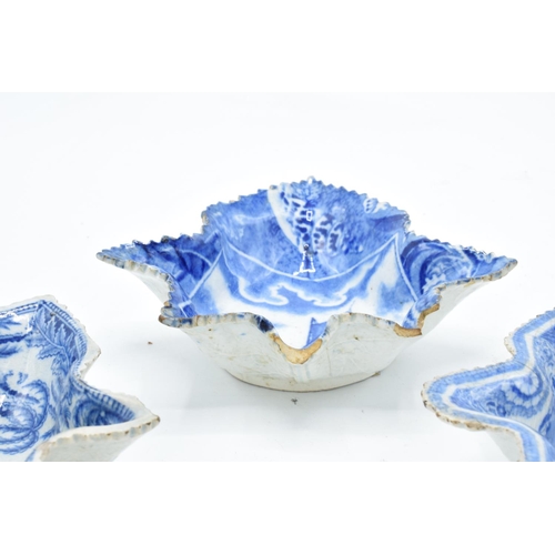 40 - A collection of English 19th century blue and white pickle dishes in the shape of a leaf: with mixed... 