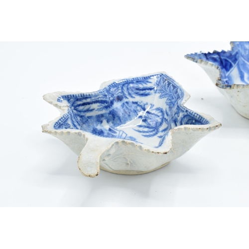 40 - A collection of English 19th century blue and white pickle dishes in the shape of a leaf: with mixed... 