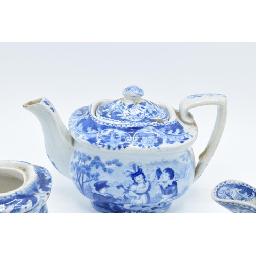 42 - A blue and white part miniature tea set including teapot, milk and sugar (no lid), cup and deep sauc... 