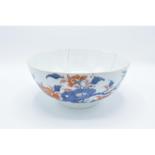 49 - Large 19th century oriental bowl with floral decoration: with extensive damage. There are extensive ... 