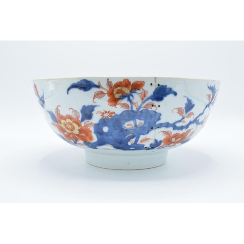 49 - Large 19th century oriental bowl with floral decoration: with extensive damage. There are extensive ... 