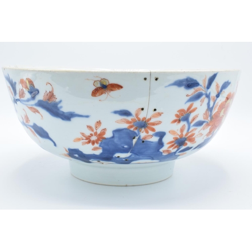 49 - Large 19th century oriental bowl with floral decoration: with extensive damage. There are extensive ... 