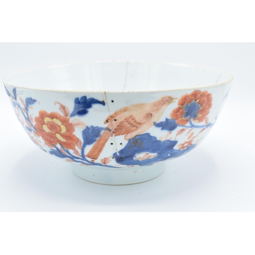 49 - Large 19th century oriental bowl with floral decoration: with extensive damage. There are extensive ... 