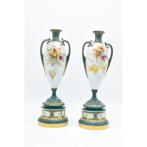 52 - Royal Worcester pair of twin-handled floral vases 1957 (unsigned) (27cm tall) One has been restored ... 