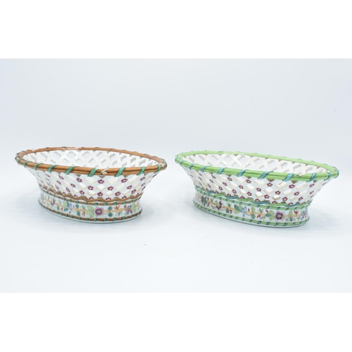 54 - Ed Honore á Paris pierced oval dessert baskets (a/f) Both are lacking their handles. One has hairlin... 