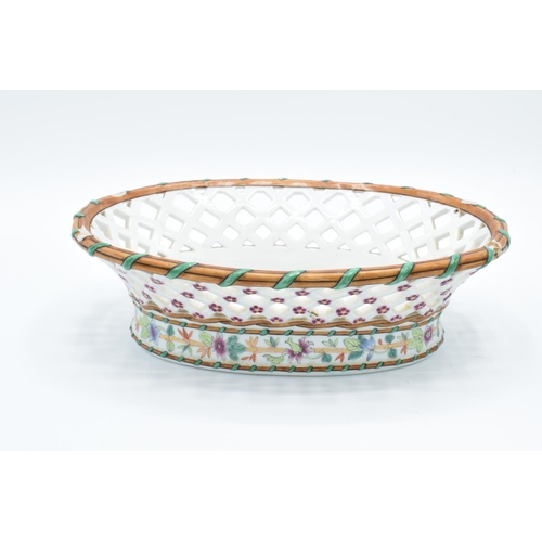 54 - Ed Honore á Paris pierced oval dessert baskets (a/f) Both are lacking their handles. One has hairlin... 