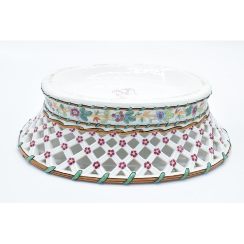 54 - Ed Honore á Paris pierced oval dessert baskets (a/f) Both are lacking their handles. One has hairlin... 