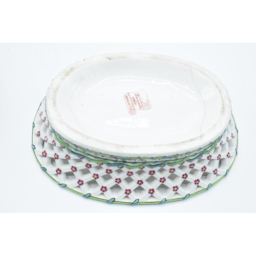 54 - Ed Honore á Paris pierced oval dessert baskets (a/f) Both are lacking their handles. One has hairlin... 