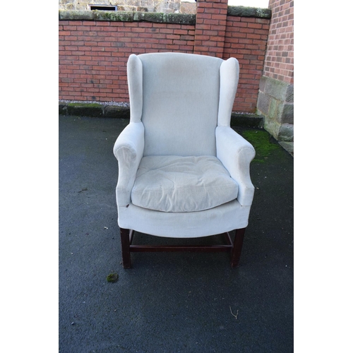 327 - George III style wingback mahogany arm chair. In good condition with age related wear as expected. C... 