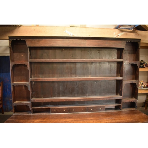 294 - Georgian large oak dresser with spice drawers: 4 draws wide. All original brass handles. Some damage... 