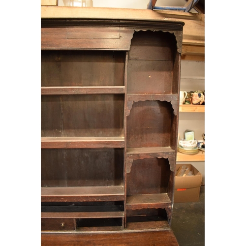 294 - Georgian large oak dresser with spice drawers: 4 draws wide. All original brass handles. Some damage... 