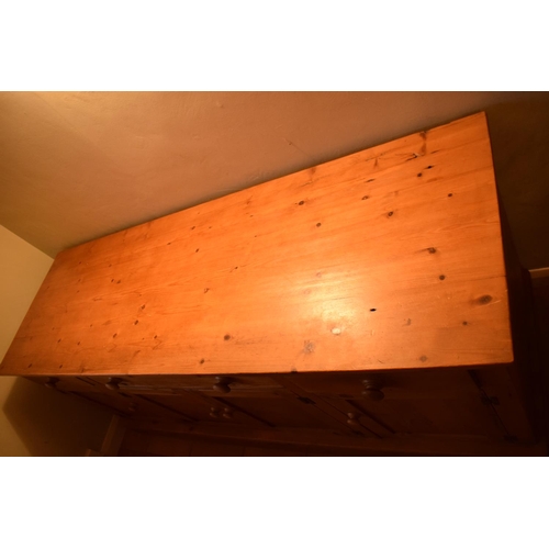 301 - 20th century pine sideboard with 3 draws and 4 doors. Signs of wear and tear and use in a family hom... 