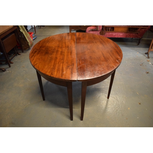 309 - Victorian mahogany circular dining table with one spare leaf. De-assembled. Sign of wear and tear. S... 