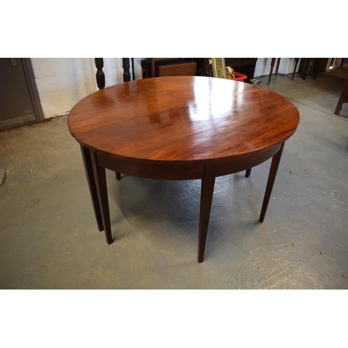 309 - Victorian mahogany circular dining table with one spare leaf. De-assembled. Sign of wear and tear. S... 