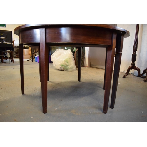 309 - Victorian mahogany circular dining table with one spare leaf. De-assembled. Sign of wear and tear. S... 