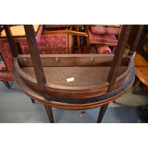 309 - Victorian mahogany circular dining table with one spare leaf. De-assembled. Sign of wear and tear. S... 