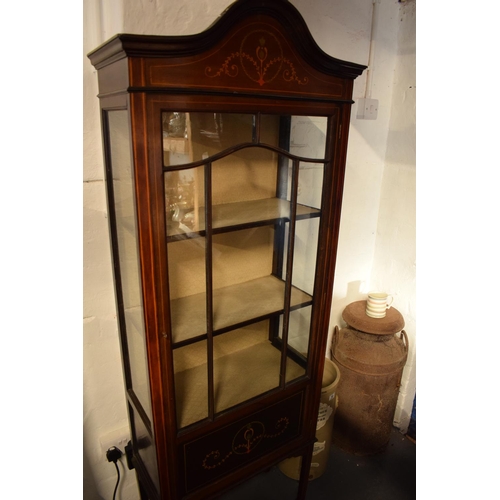 310 - Edwardian inlaid mahogany and glass display cabinet. There is a crack to one leg. worm is apparent, ... 