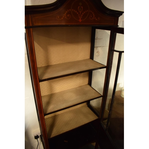 310 - Edwardian inlaid mahogany and glass display cabinet. There is a crack to one leg. worm is apparent, ... 