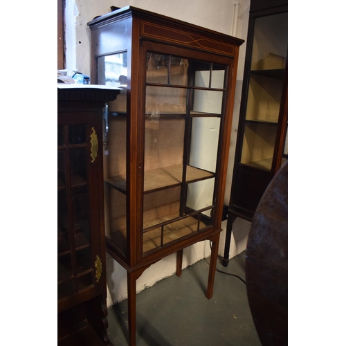 311 - Edwardian inlaid mahogany and glass display cabinet. In good functional condition with signs of wear... 