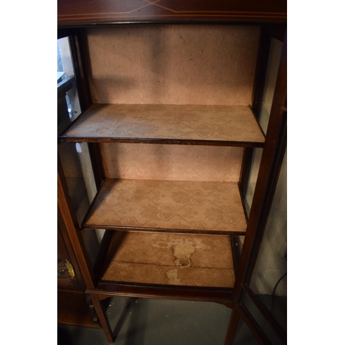 311 - Edwardian inlaid mahogany and glass display cabinet. In good functional condition with signs of wear... 