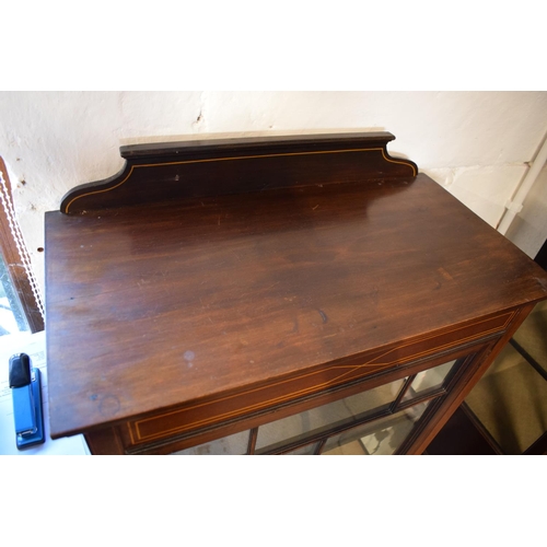 311 - Edwardian inlaid mahogany and glass display cabinet. In good functional condition with signs of wear... 