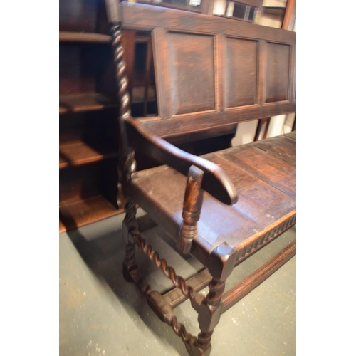 315 - Late 18th century oak carved settle with barley twist supports. In good stable, functional condition... 