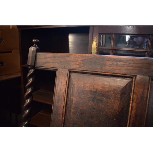 315 - Late 18th century oak carved settle with barley twist supports. In good stable, functional condition... 