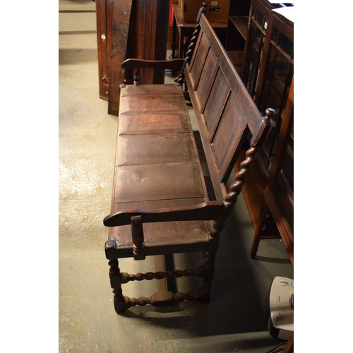 315 - Late 18th century oak carved settle with barley twist supports. In good stable, functional condition... 