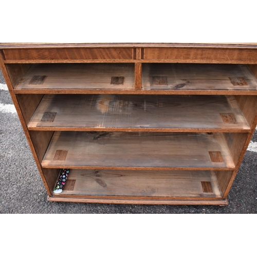 317 - Edwardian oak chest of drawers on caster wheels. There some splits to the wood and sections of missi... 