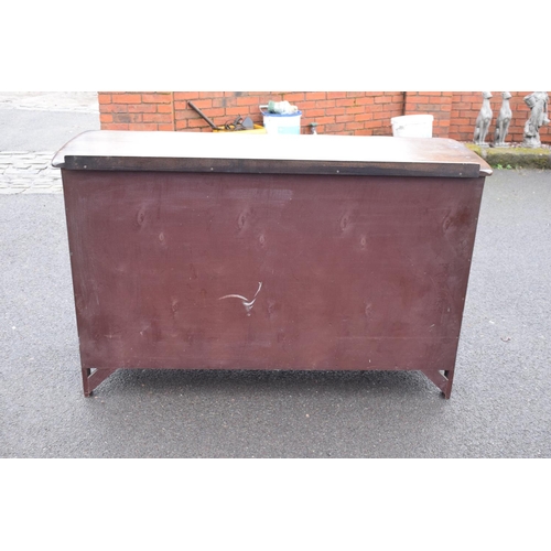 322 - Ercol dark elm sideboard with 2 doors and 4 drawers. In good functional condition with some areas of... 