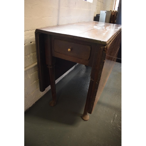 335 - Victorian oak drop leaf table. 118 x 150 when constructed x 78cm tall. In good condition. In need of... 