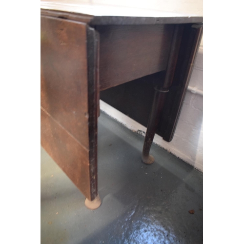 335 - Victorian oak drop leaf table. 118 x 150 when constructed x 78cm tall. In good condition. In need of... 