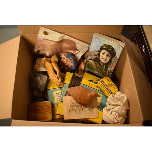 280D - A mixed collection of items to include old tins, labels, wooden figures etc. No condition reports, e... 