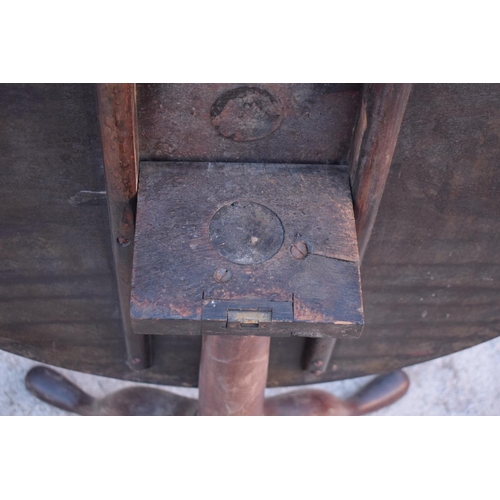 343 - Early 20th century oak circular tilt top tripod table, potentially the top is newer than the base. S... 