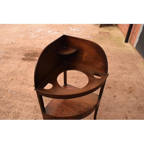 344 - Late Victorian mahogany corner basin stand. In good condition with some areas of damage including br... 