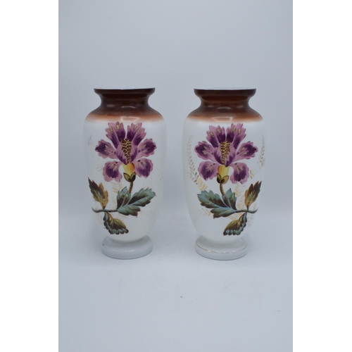 1 - A large pair of white opaline glass vases with floral decoration. Wear and losses to the paint. Some... 