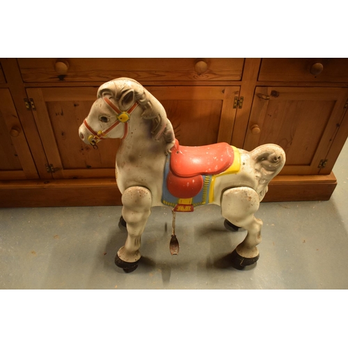 107 - Mobo walking horse children's toy 1950s. In working order though untested fully. Missing one foot ho... 