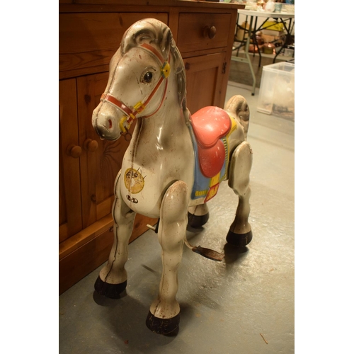 107 - Mobo walking horse children's toy 1950s. In working order though untested fully. Missing one foot ho... 