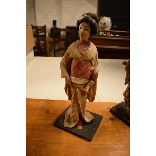 108 - A collection of 20th Japanese silk faced Geisha dolls (5). The dolls are I need of attention as they... 