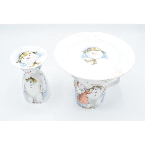 112 - Royal Doulton snowman breakfast set together with an egg cup and plate (2 sets). In good condition w... 